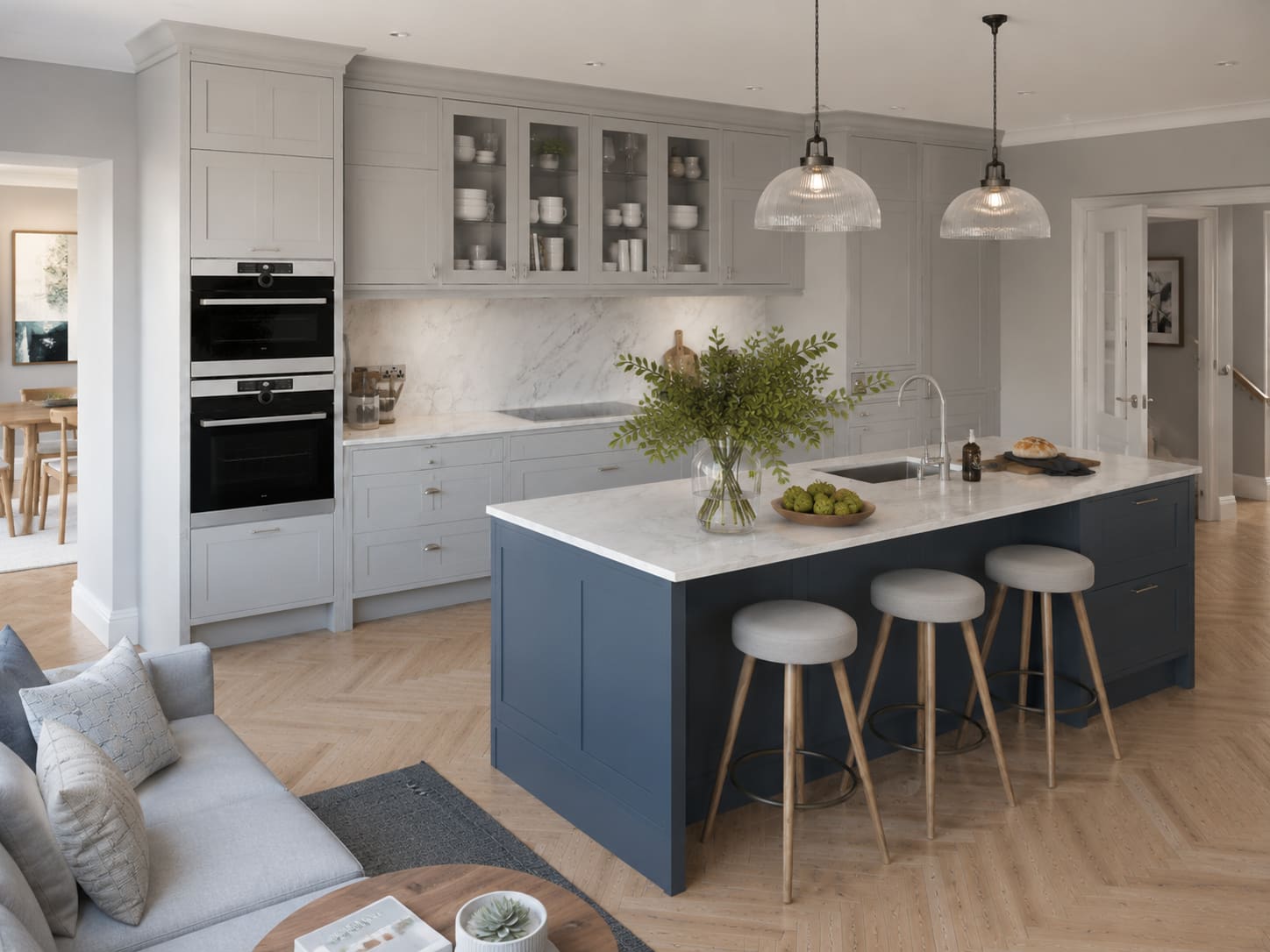 Pearl bespoke kitchen with slate-blue island and marble worktops